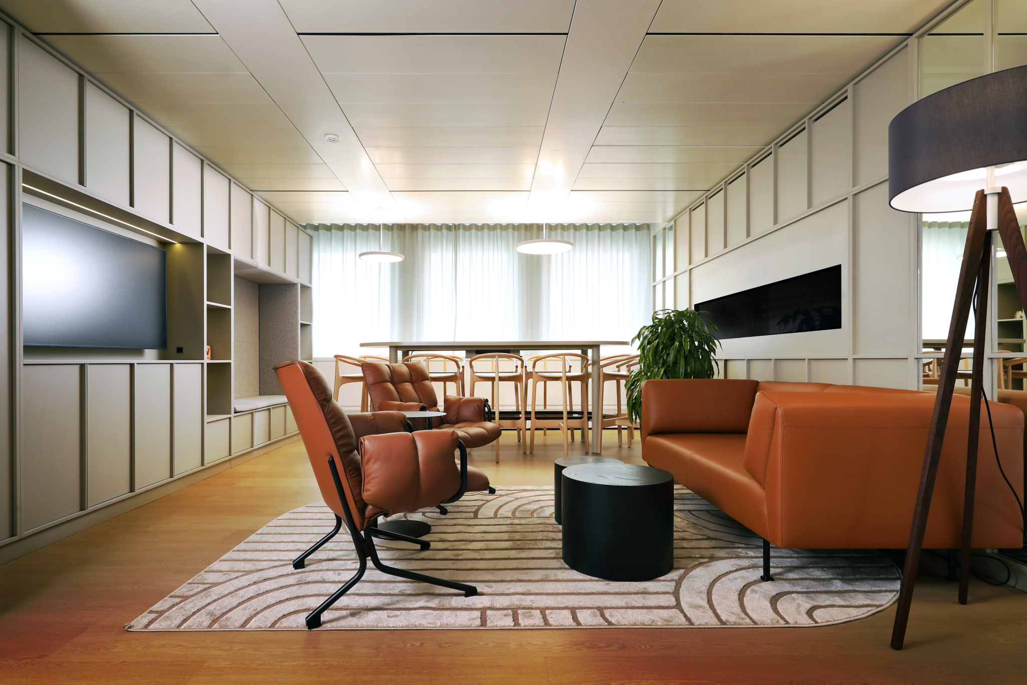 The interior of a modern office's co-working space